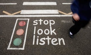 Stop, look, listen sign on road